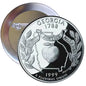Round Georgia state quarter-style pinback button with black-and-white seal design