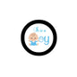 Round pinback button with baby icon and "It is a boy" text
