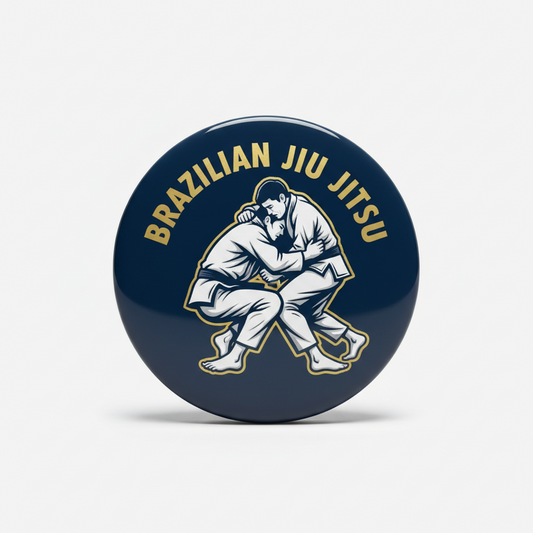 2.25-inch jiu jitsu pinback button, navy blue with gold text and wrestler grappling graphic
