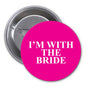 1.25-inch pinback button with pink face and white 'I'm with the Bride' text