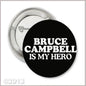 Round black button pin with white text: BRUCE CAMPBELL IS MY HERO