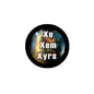 2.25-inch round galaxy pronouns pin badge, black rim, "Xe Xem Xyrs" text