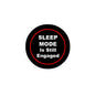 Black pinback button with red ring and white 'Sleep Mode Is Still Engaged' text
