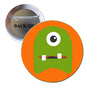 Orange and green monster pinback button with large single white eye and brown mouth