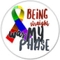 Round pinback button with rainbow ribbon and stylized text reading “BEING STRAIGHT my PHASE”