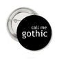 Round black pinback button with 'call me gothic' text and silver metal back