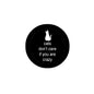 2.25-inch pinback button with white cat icon and text on black background
