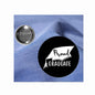 2.25-inch pinback badge with black circle, silver edge, “Proud Graduate” print and cap