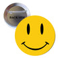 2.25-inch yellow smiley face pinback button with black features and metal safety pin
