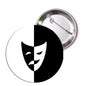 2.25-inch pinback button with split comedy and tragedy theater masks, black and white