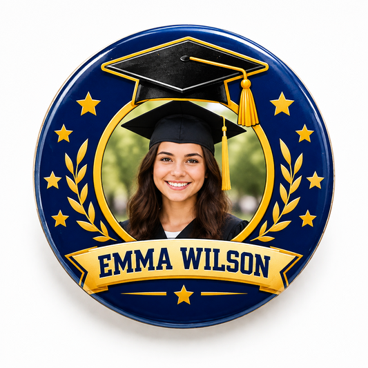 A round graduation-themed pin or badge with a dark blue background, gold stars, a black graduation cap, a rolled diploma with a blue bow, and the word "SENIOR" in large gold letters.