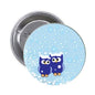 Blue owl pinback button with snowflake pattern, metal backing, 2.25-inch