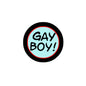 Round pinback button with black rim and light blue center reading “GAY BOY!”