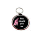 2.25-inch round keychain holder with black face, pink flowers, and 'You should pick me' text