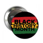 Round button pinback brooch with “BLACK HISTORY MONTH” text in red, yellow, and green