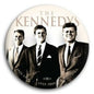 Circular pinback button with three black-and-white Kennedy family portraits
