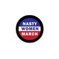 Round pinback badge with black rim and 'NASTY WOMEN MARCH' text