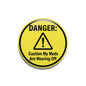 2.25-inch pinback button with yellow warning design, DANGER text, and caution message