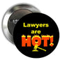 Black pinback button badge: 'Lawyers are HOT!' with flames and trophy icon