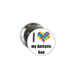 Round pinback badge with white face, black text “I my Autistic Son” and puzzle heart