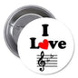 Round pinback button: 'Live' with red heart and black music notes