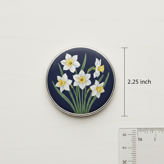 2.25-inch round pinback button with white daisies on dark blue, silver edge