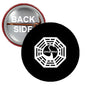 2.25-inch pinback badge with black face and white Dharma wheel symbol, silver back