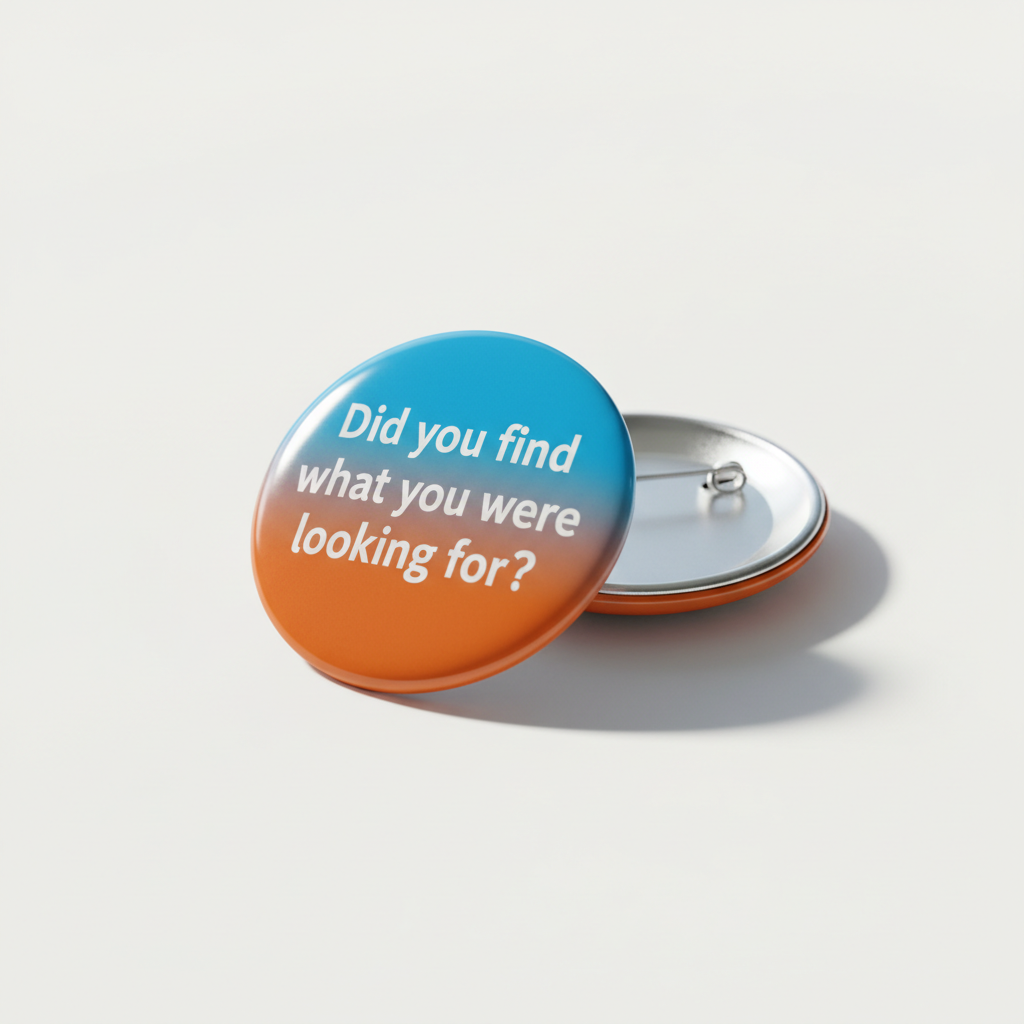 Round 2.25-inch pinback button with blue and orange text design, metal clasp on back