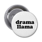 1.25-inch drama llama pinback button with black text on white front