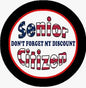2.25-inch circular pinback button with black rim and 'Senior Citizen' joke text