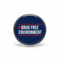 Drug Free Environment round pinback button, blue with red cross and white lettering