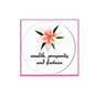 2.25-inch pinback badge with pink flower and text 'wealth, prosperity and fortune'