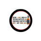 Round 1.25-inch pinback button with black border, red ring, and printed bottle message