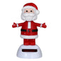 Solar-powered dancing snowman bobble toy with red suit and white beard, arms out