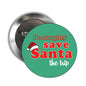 Round teal pinback badge with red 'Be naughty save Santa the trip' lettering