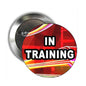 2.25-inch pinback badge, red IN TRAINING graphic with silver metal back