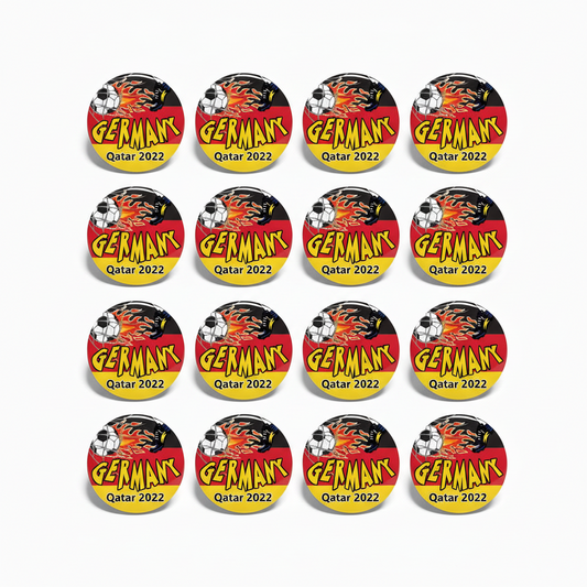 Set of 12 circular Germany Qatar 2022 football pinback buttons, yellow and black with red accents