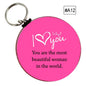 Pink round keychain with heart and I Love You text