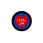 2.25-inch pinback button with black rim, blue center, and red heart text