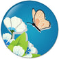 Blue circular pinback button with peach butterfly and white flowers design