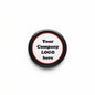 Round pinback badge with black edge and red ring; white center says Your Company LOGO here.