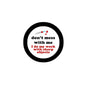 Round black button pin with white center text: “don't mess with me”