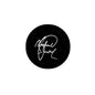 Black pinback button badge with white script signature text