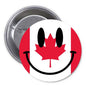 Canada flag smiley face pinback button with red maple leaf and black grin