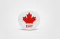 2.25-inch maple leaf pinback button with red EH? text and red leaf