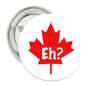 Maple leaf pinback button with red leaf and “Eh?” text on light background