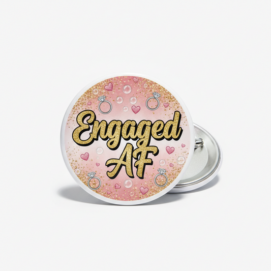 Round bachelorette pin with pink sparkle background and “Engaged AF” text, metal pinback