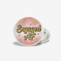 Round bachelorette pin with pink sparkle background and “Engaged AF” text, metal pinback
