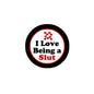 Round pinback badge: 'I Love Being a Slut' with red hearts