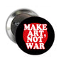 2.25-inch pinback button, black with red and white “MAKE ART, NOT WAR” text